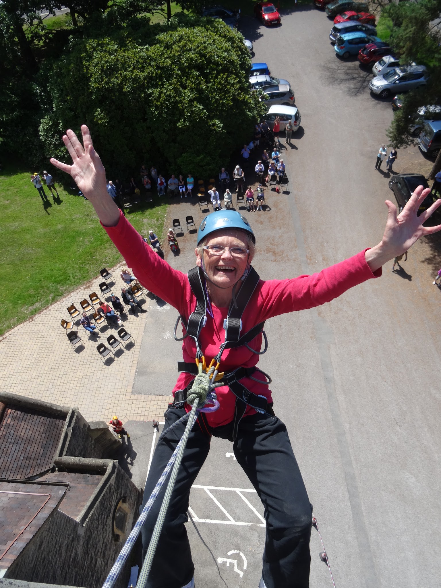 Happy participant abseiling
