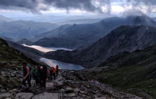 A 3 national 3 peaks group heading up to Snowdon summit