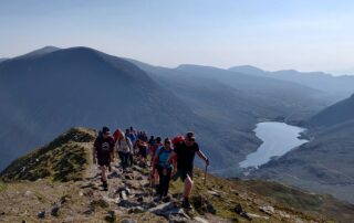 Ridge above Llyn Ogwen Walkers on a rocky ridge above Llyn Ogwen in Snowdonia