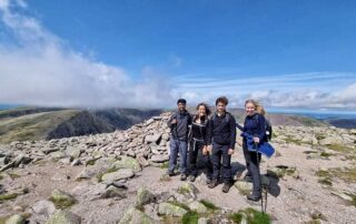 Cairngorm 4000s summit team Cairngorm 4000s team on a bouldery summit plateau