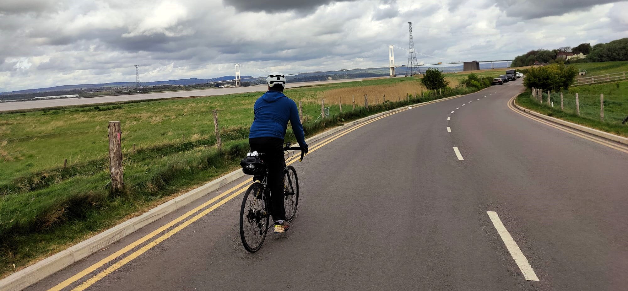 Cyclist on a quiet country road on the Bristol to Swansea ride